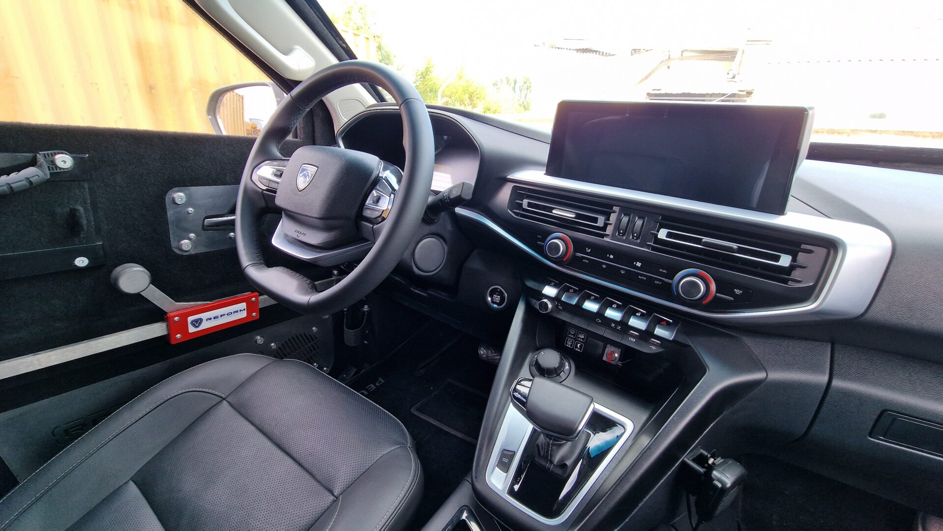 Dashboard and center console of an armored Peugeot Landtrek